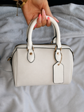 Black and white detailed handbag