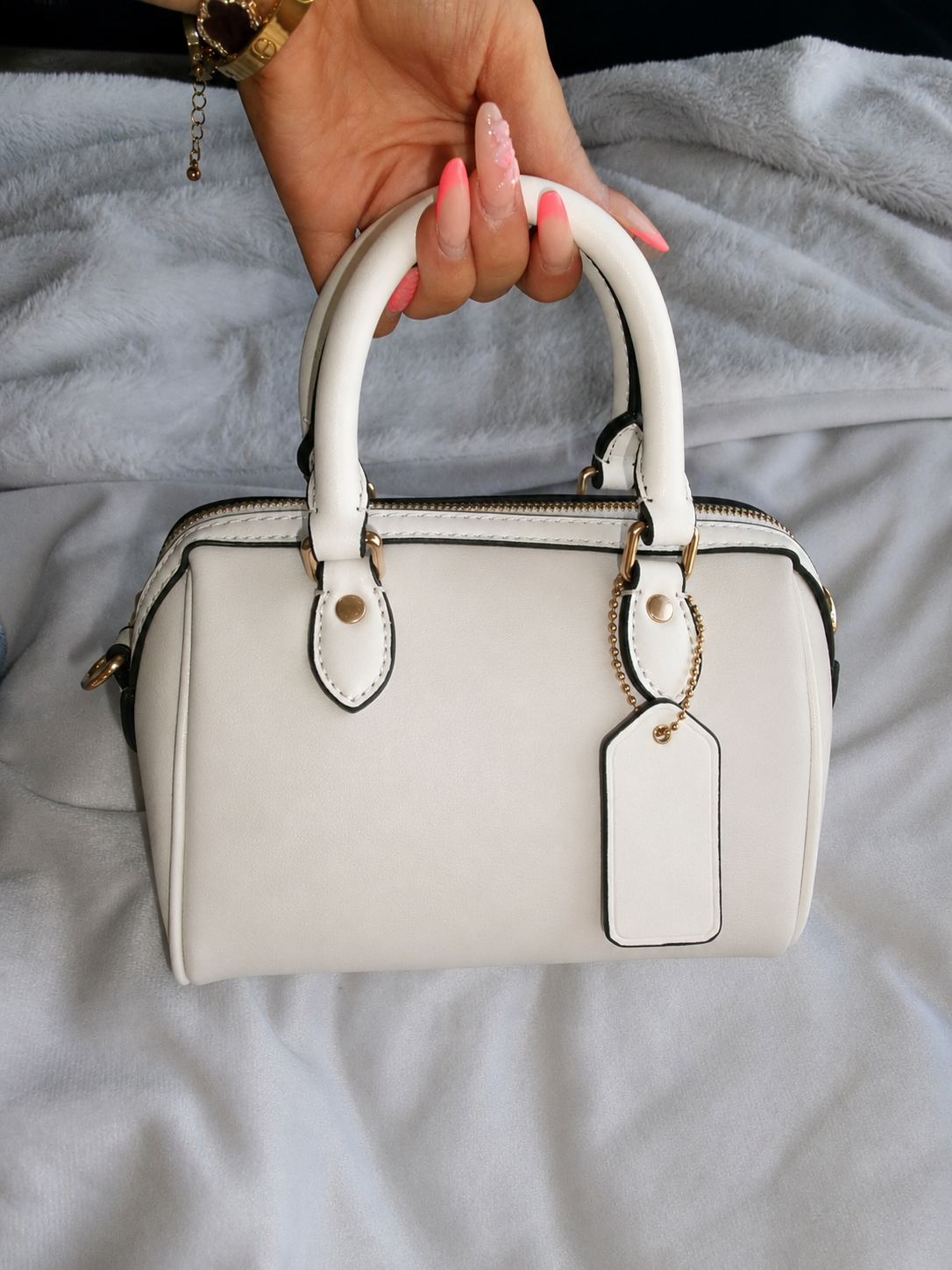 Black and white detailed handbag