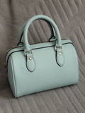 Blue/ turquoise patterned handbag