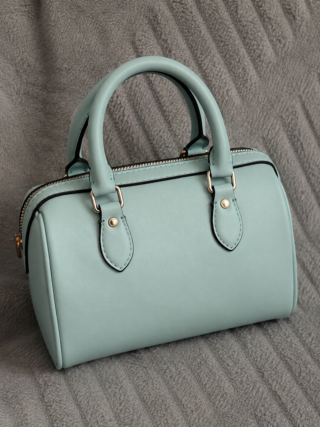 Blue/ turquoise patterned handbag